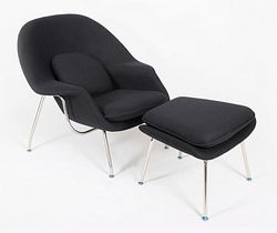 womb chair and ottoman in woolen fabric by Eero Saarinen